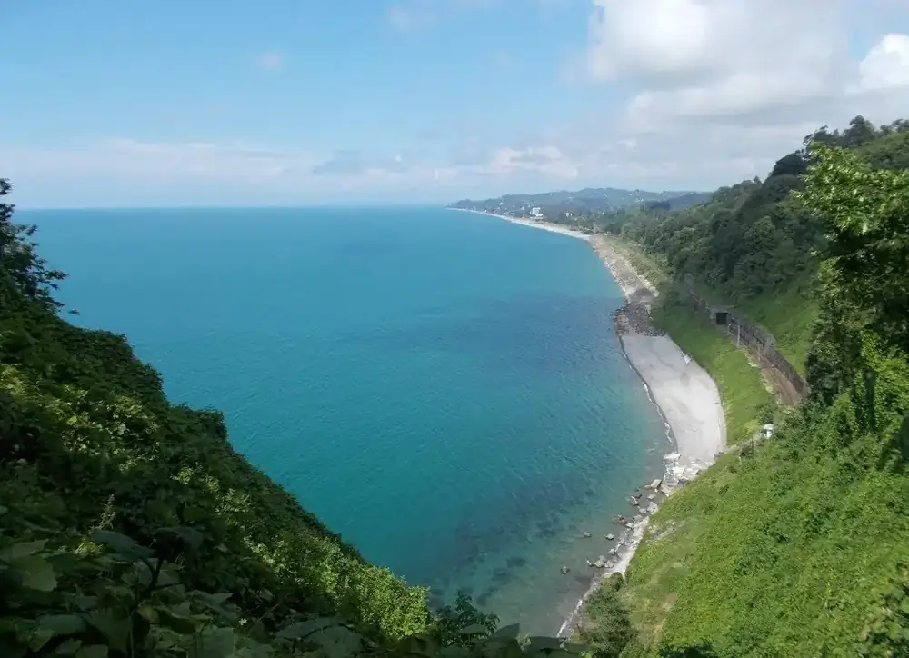 Green coastline and the Black Sea seen from above Batumi
